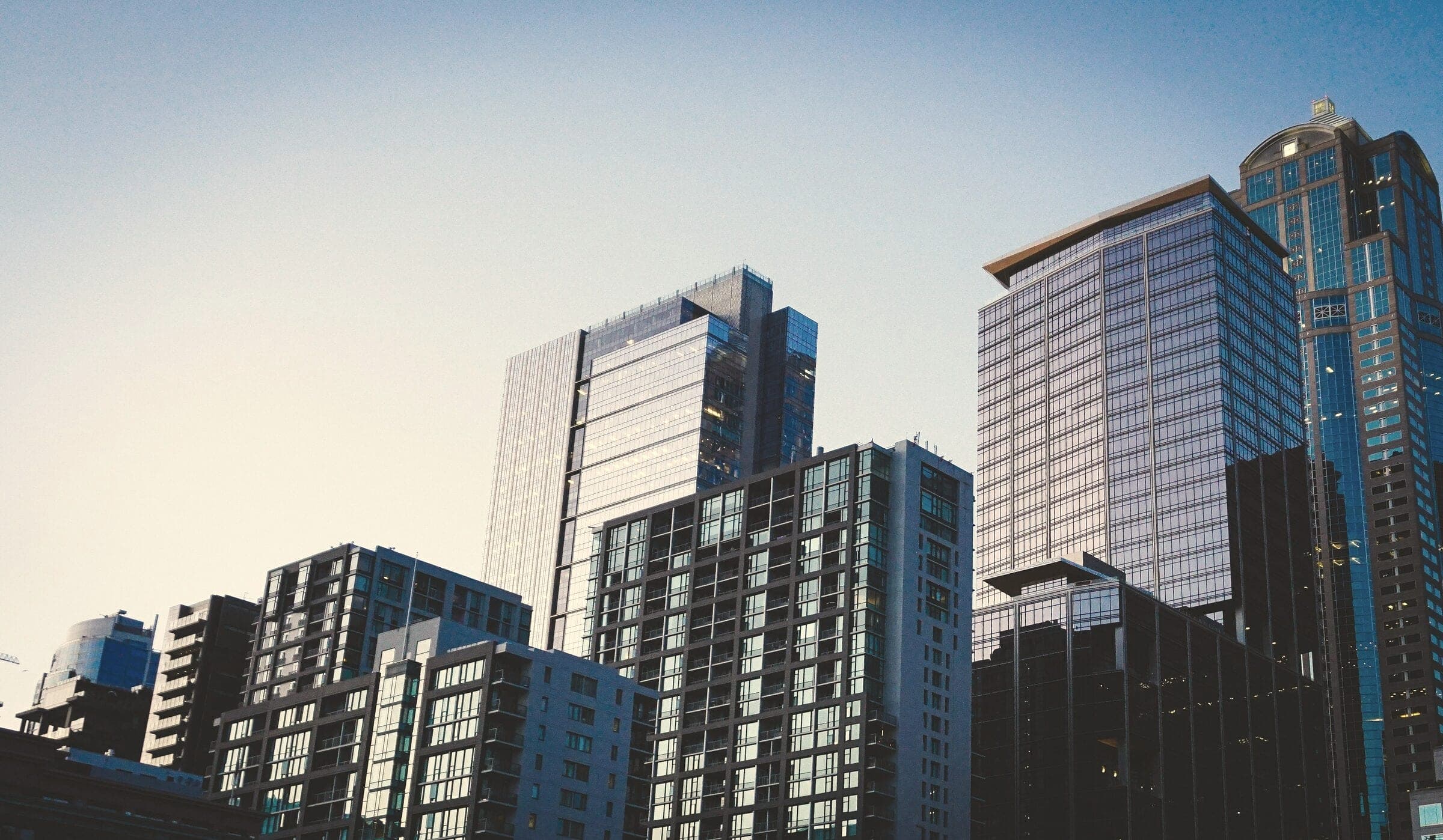 City skyline under a clear blue sky
